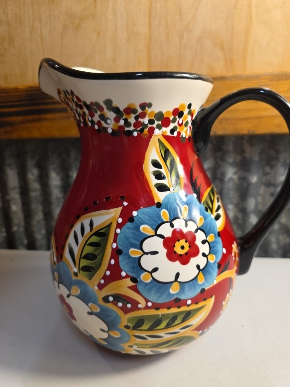 Emily Designs Red Floral Ceramic Pitcher with Blue and Yellow Accents